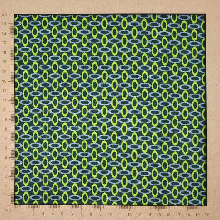 Green fabric 70s style with oval lime and grey patterns - cotton