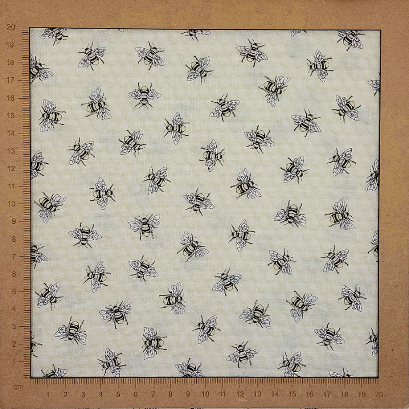 Bee fabric on pale yellow background - cotton