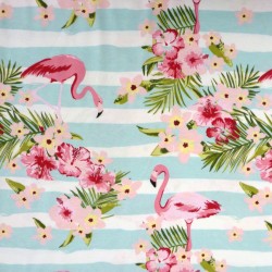 Jersey fabric with flamingos and tropical flowers