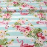 Jersey fabric with flamingos and tropical flowers