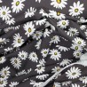 Dark grey jersey fabric with daisies