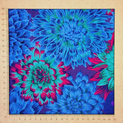 Kaffe Fassett fabric with blue green red chrysanthemums purple background